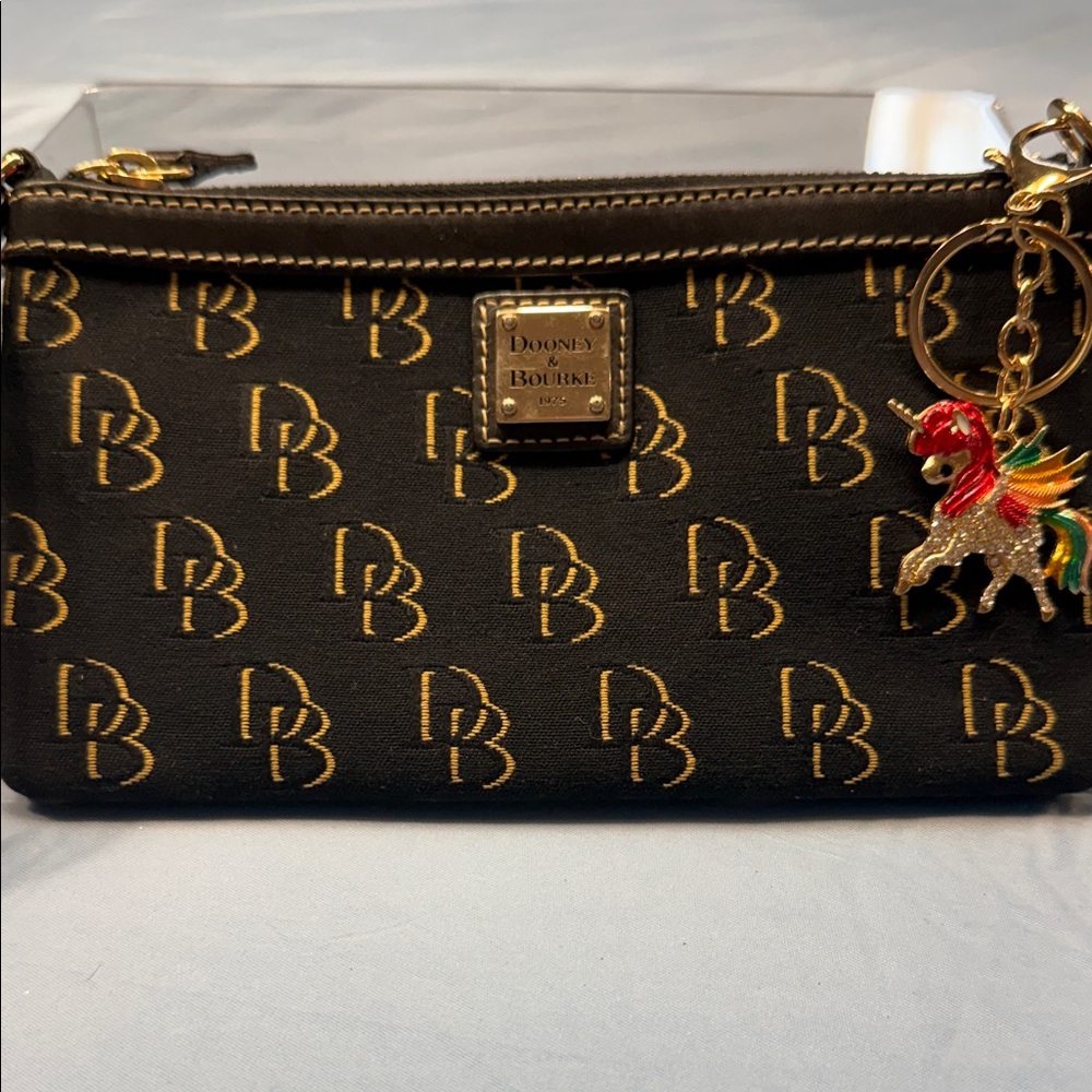 Dooney & Bourke Black Wristlet with Gold Accents & Key Charm